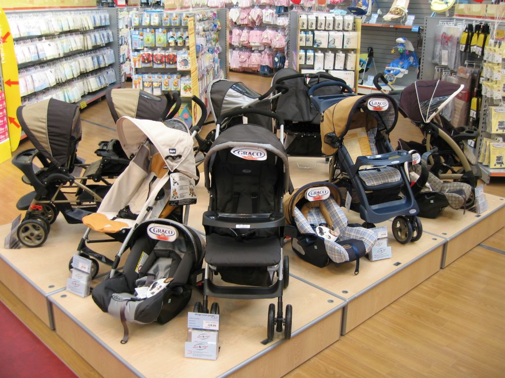 Plinth display of pushchairs (strollers) and child seats at Woolworths Bristol Hartcliffe (2005)
