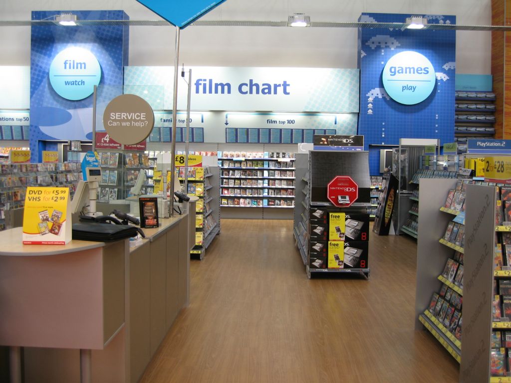 The huge entertainment department in an out-of-town Woolworths store in 2005, including its film chart and customer service desk