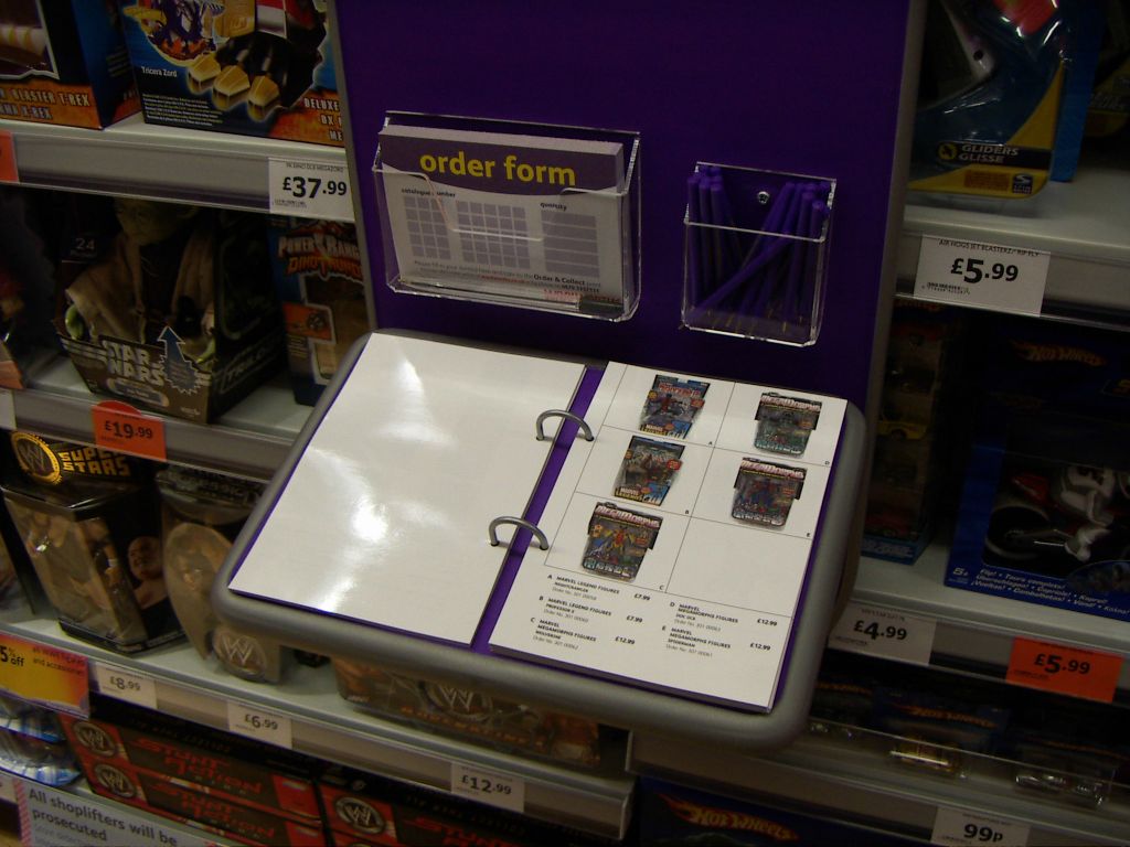 A close up of the laminated pages of the bespoke Boys Toys catalogue which had been hand-made for the experimental Kingswood, Bristol Woolworths (2005)