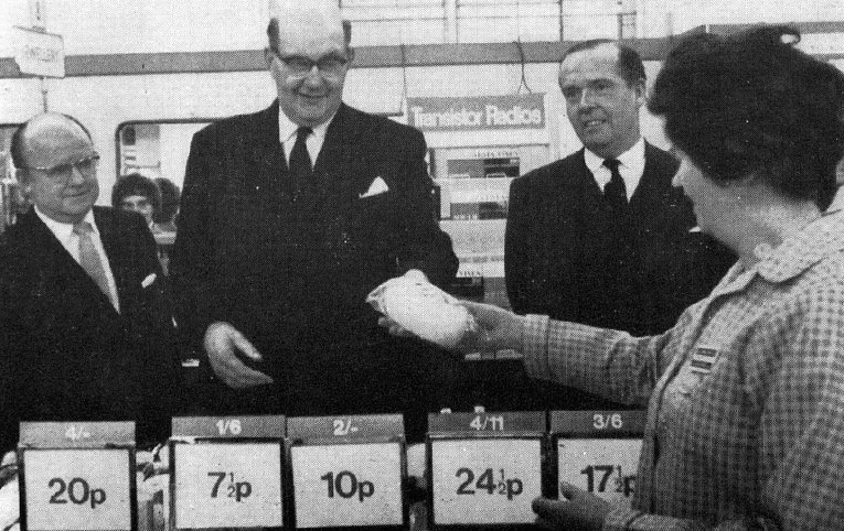 Lord Fiske, Chairman of the Decimal Currency Board, makes an inaugural decimal purchase in the Woolworth store in The Strand, London, WC2. This picture appeared in the London Times the day after decimalisation, 16 February 1971.