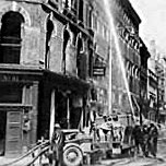 The last day of the original Woolworths in Old Town Street, Plymouth, Devon.  After an incendiary bomb one night, the following night German bombers returned to finish the job.