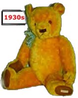 By the 1930s the Teddy Bear had become a little plumper, but retained the distinctive ribbon.  They have a sewn label on the left foot that reads "Chad Valley Hygienic Toys".  This one was made at the Wrekin Toy Works, Staffordshire.