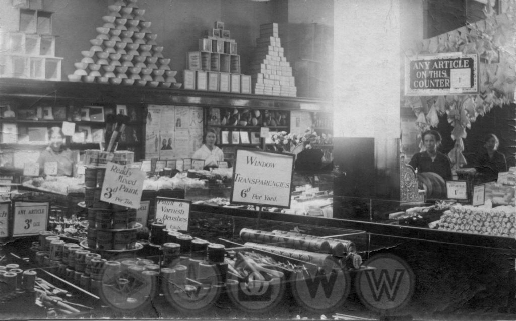 The interior of the Croydon store in 1912. Note the handwritten signs, and the pyramid displays above the cornice line which were to become a hallmark of the brand. At its closure in 2008, Croydon was the nation's longest serving Woolies in its original location.