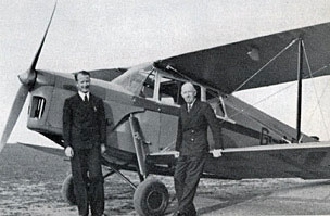 Eric Pasold and London Agent A. C. Hurst stand in front of Ladybird's first company plane.