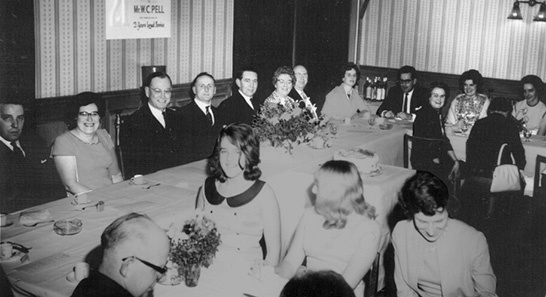 A celebratory dinner to mark William Pell's 21 years service at Woolworth's in March 1965