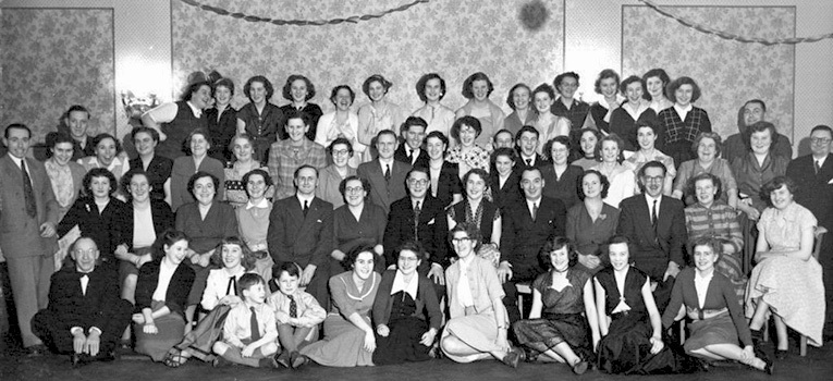 Christmas celebrations at the Taunton Woolworth's provided an opportunity for all of the staff and management to let their hair down.  The Manager, Mr. B.K.R. Manley is in the centre of the photograph, with Bill and Joan Pell on his right. Bill's new boss had advised him to remove his moustache if he wanted to get on! (He re-grew it after his retirement.)