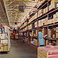 Staff pick goods for despatch to Shoppers World stores in the company's dedicated warehouse in Heywood, Lancashire in 1975