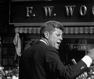 President John F. Kennedy campaigns for the Democrats outside an F. W. Woolworth store in 1962
