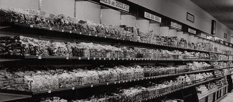 The original self-service stores dropped weigh-out products like pic'n'mix, replacing them with pre-weighed, standard size bags which were pre-packed at the factory