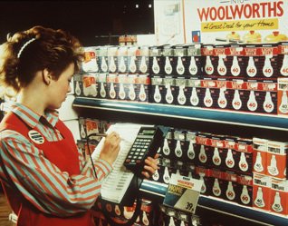 Light buld moment: a colleague uses a Telxon PTC-701 terminal to order light bulbs from Woolworths' new 'Range Book' in 1989