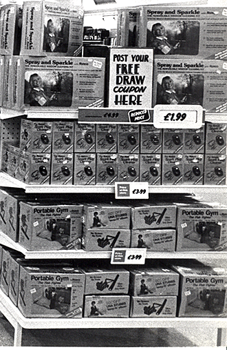 A typical promotion from 1984, where the Buyer for Department 275 Sporting Goods had bought up a supplier's surplus stock of Portable Gyms, Spray and Sparkles, the Una Stubbs Keep Fit Kit and a Spark Plug Cleaner as his month's promotions in early October. The items had no listed space, so if they didn't sell, they would have nowhere to go and be taken away to the stockroom until they were required for another promotion. Under Mulcahy's reforms Buyers would be discouraged from listing this type of promotion, and would have to take a hit to their margin to cut the price as deeply as necessary to sell the item through before they could use the space to sell their next range. The rule brought an end to many years of Ronco items dominating the feature ends in-store at certain times of year. However did the public survive without their smell-free ashtrees or ball-back indoor golf holes?