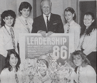 Winston Churchill MP, grandson of the famous Prime Minister, introduces students at Flixton Girls Secondary School in his Davyhulme Manchester Constituency to Woolworths' Leadership '86 Competition to find and reward tomorrow's leaders