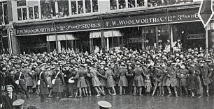 Large crowds line the route for the funeral procession of King George V in 1936.