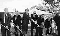 Participating in the 28 September 2001 groundbreaking ceremony for the Charlton College of Business were (left to right) Trustee Peter Lewenberg, UMass President William Bulger, Chancellor Jean F. MacCormack, former UMD President William C. Wild, Earl Perry “Chuck” Charlton II, former Dean Richard Ward and Dean Ronald McNeil.