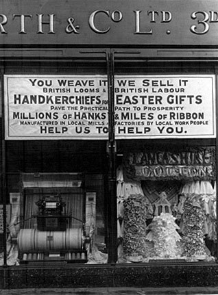 'You weave it, we sell it' - A popular window display for Woolworth stores in Lancashire during the 1930s, that served to emphasise the fact that nearly all of the firm's goods were British made at the time