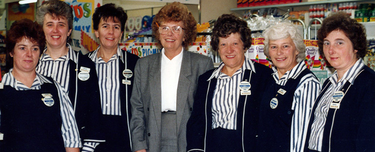 Heather Grant, the Store Manager of the quaint Dickensian Woolworths store at Haslemere, Surrey, with her team sporting new Woolworths blue and cream striped uniforms in 1988. Heather Grant, the Store Manager of the quaint Dickensian Woolworths store at Haslemere, Surrey, with her team sporting new Woolworths blue and cream striped uniforms in 1988.