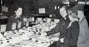 Almost business as usual in a British Woolworth stores at Christmas in 1939