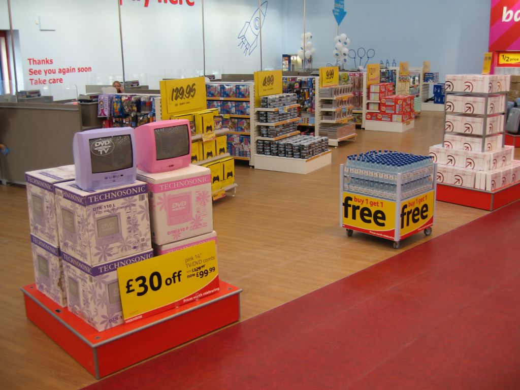 Bold plinth in the queueing area before the checkouts in an out-of-town Woolies