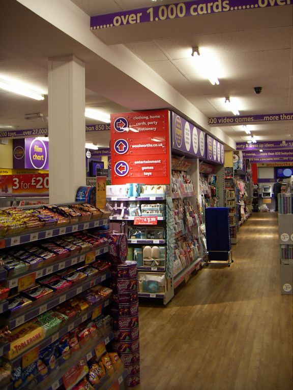 Confectionery countlines displayed on a tall beanstalk counter adjacent to the main gangway in Woolworths Kingswood (2005)