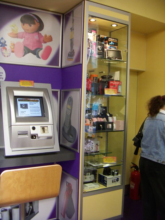 Nicknamed the portal, a bank of three kiosks formed an ordering point along the back wall of the Kingswood Woolworths in 2005