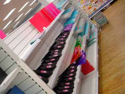 A depleted display of files and folders in the Redhill store prior to modernisation