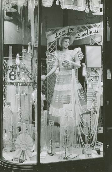 Lace for lovelinessm, a new range and a new style of window display by Woolworth's Textile and Fashion Buyer Herbert Cue, features in this windo from the store in Chiswick High Road, London