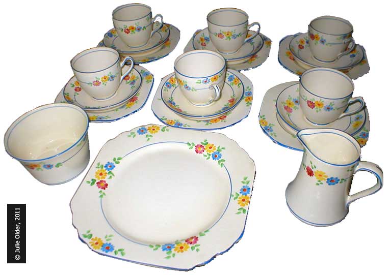 A fine example of a Thirties 21-piece Teaset from F.W. Woolworth, perfectly preserved after eighty years. It includes a cake plate, sugar bowl, cream jug and six teacups, saucers and teaplates. In 1931 the complete set sold for ten shillings (50p at the time, equivalent to £21 today). Picture with special thanks to Julie Older.