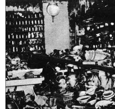 The ramshackle interior of the first successful Woolworths store in Lancaster, Pennsylvania, USA, which was lit by a single gas lamp