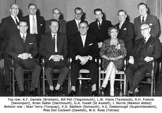 The best in the west - local Woolies Managers from the Devon District, who met regularly and supported each other in adversity during the 1960s. Top row: (L to R) K.F. Daniels (Brixham), Bill Pell (Teignmouth), L.W. Hions (Tavistock), R.H. Francis (Devonport), Brian Salter (Dartmouth), G.A. Yoxall (St Austell), I. Norris (Newton Abbot) Bottom row : Stan Terry (Torquay), V.D. Baldwin (Exmouth), H.E. Desborough (Superintendent), Miss Dot Cockwill (Dawlish) and W.S. Rose (Totnes)