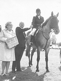 Bill and Joan Pell presenting the prizes at the Hertford Horse Show, which was sponsored by Woolworth's Winfield own brand
