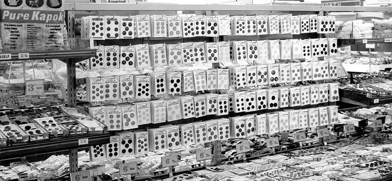 A huge range of buttons and haberdashery on sale in Woolworth's in the 1950s.  Nearly all of the items displayed are either threepence or sixpence, making this one of very few departments where prices had been held since the before World War II