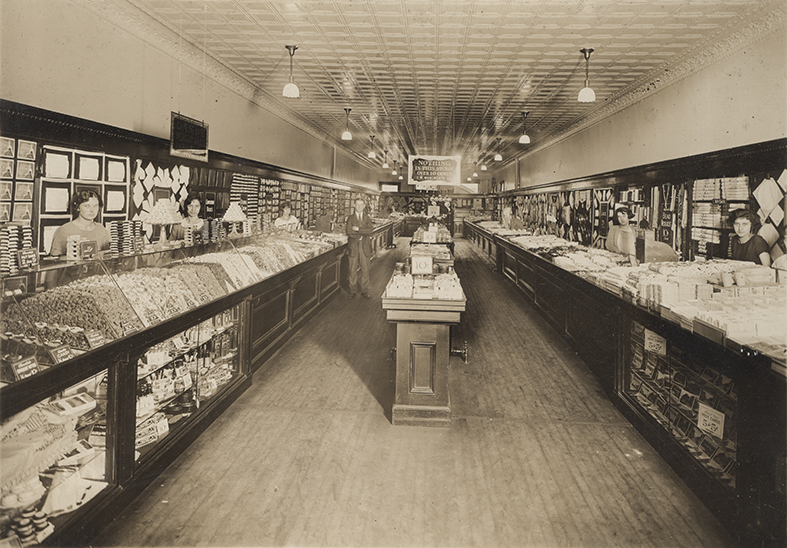 interior view of a new deep, narrow new-build American five and ten cent Woolworth store from 1923