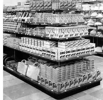 Soap powder and cleaning materials pictured at Woolworths in Kingsbury, London in 1956