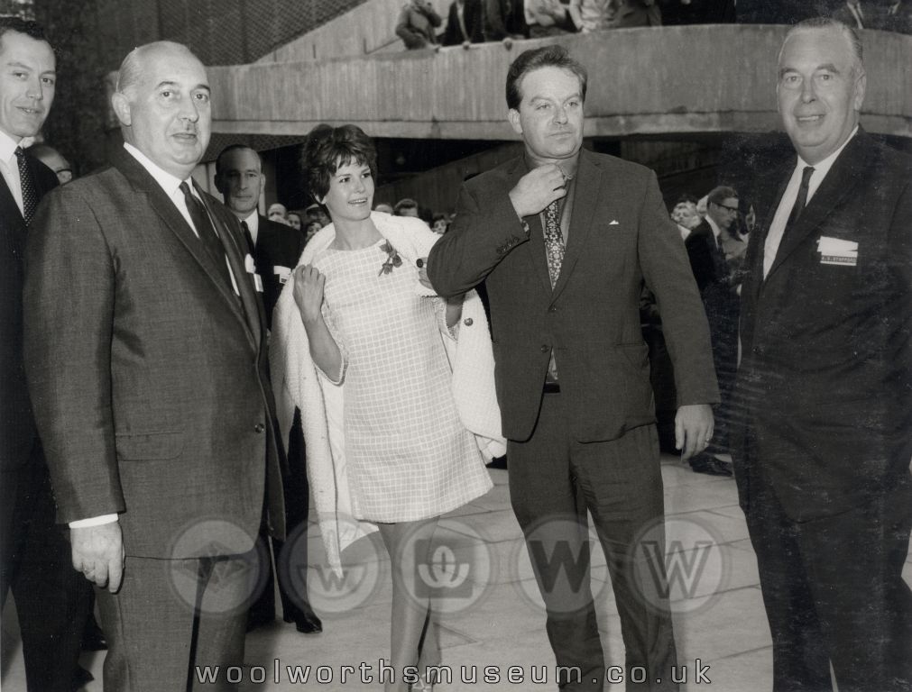 Woolco supremo Dick( R.G) Evans (left) and Buying Controller Sid (A.S.) Stafford welcome Mary Holland and Richard Clarke to the brand new Woolco store. Their Oxo TV commercial characters Katie and Phillip had superstar status in the Sixties and were a popular choice as celebrities.