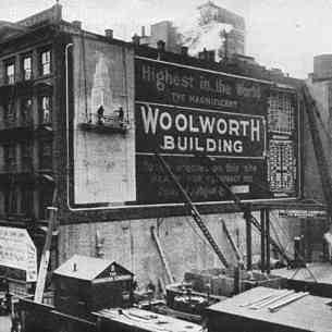 Announcing the construction of the Woolworth Building - "highest in the world".  Manhattan got a surprise on their way to work when they found who had been buying all of the land in Broadway and Barclay Streets.